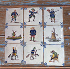 Rare 9-Piece Makkum Delft Tile Suite – 17th-Century Dutch Figures & Windmills, Artisan Polychrome
