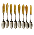 Vintage silver plated and bakelite café au lait spoons, set of eight, with warm honey patina. Classic European café style with authentic age character.