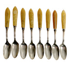 Vintage silver plated and bakelite café au lait spoons, set of eight, with warm honey patina. Classic European café style with authentic age character.