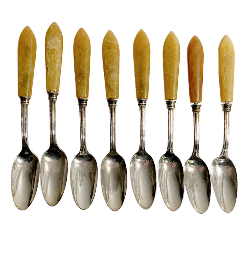 Vintage silver plated and bakelite café au lait spoons, set of eight, with warm honey patina. Classic European café style with authentic age character.