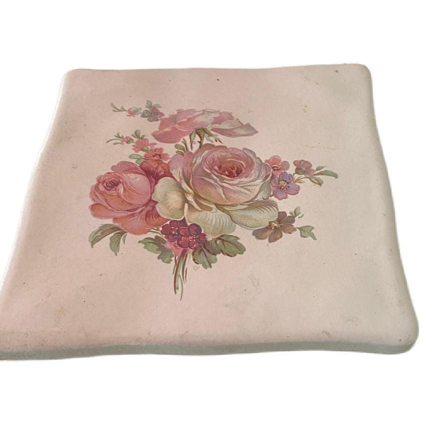 vintage shabby chic tile trivet for tea pot with large pink rose bouquet in the center.