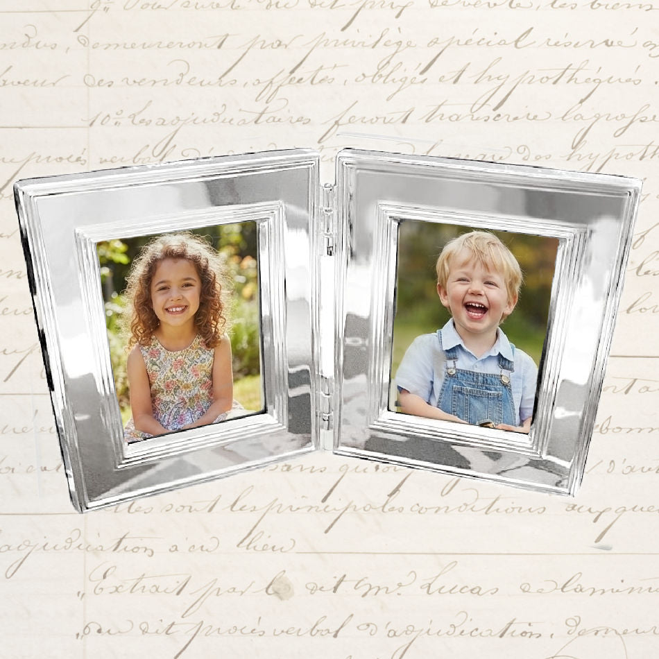 Vintage French Christofle sterling silver double photo frame with two children’s photographs