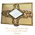 Decorative gold-encased Jewelry casket with French silk under celluloid 