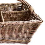 Vintage divided country basket showing its hand-woven interior compartments.
