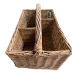 Side view of a vintage hand-woven divided basket with traditional country styling.