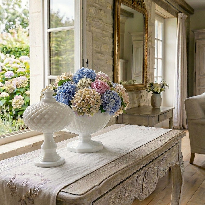 vintage mild glass compote and lidded dish in french country living room with flowers