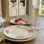 Set vintage Spode Dubarry plates tablescape styling English transferware styled on atable for lady's tea with champagne and French tarts.