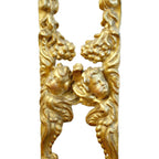 Detailed view of antique French angel fragment carving and timeworn patina