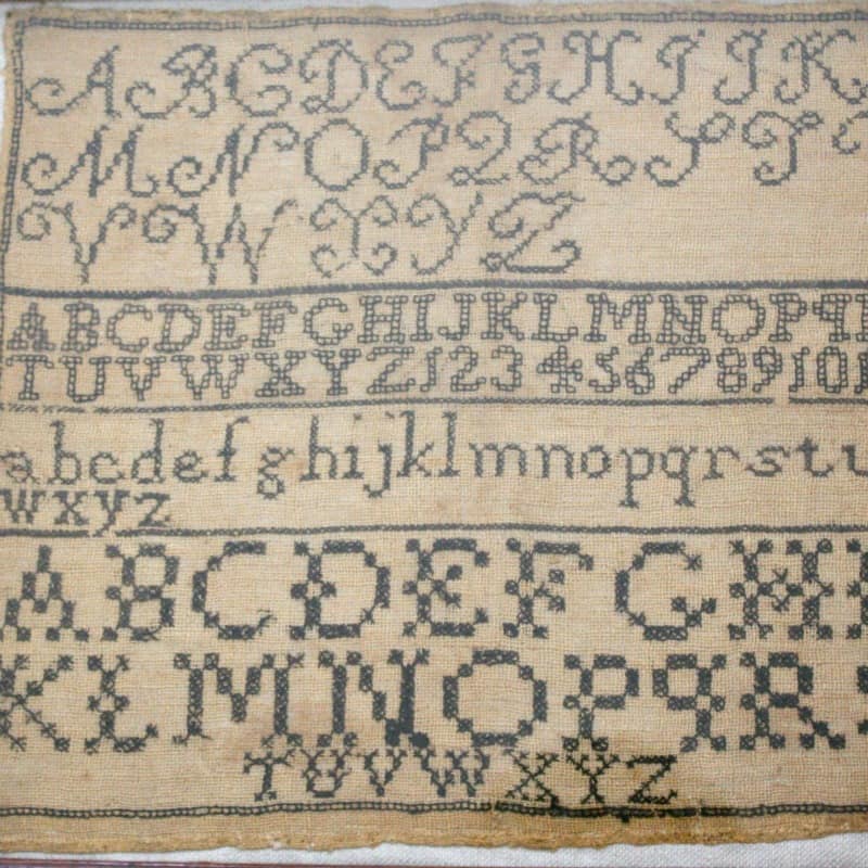 Antique 19th century handstitched ABC sampler. Charming textile with delicate embroidery, perfect for textile collectors, add historic character to your home.