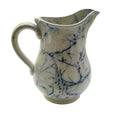 Rare antique ironstone pitcher in blue and white marble design