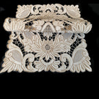 Complete set of twelve antique embroidered linen placemats from a Madeira estate collection