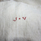 Original J.V. embroidered family laundry monogram on antique French linen tablecloth