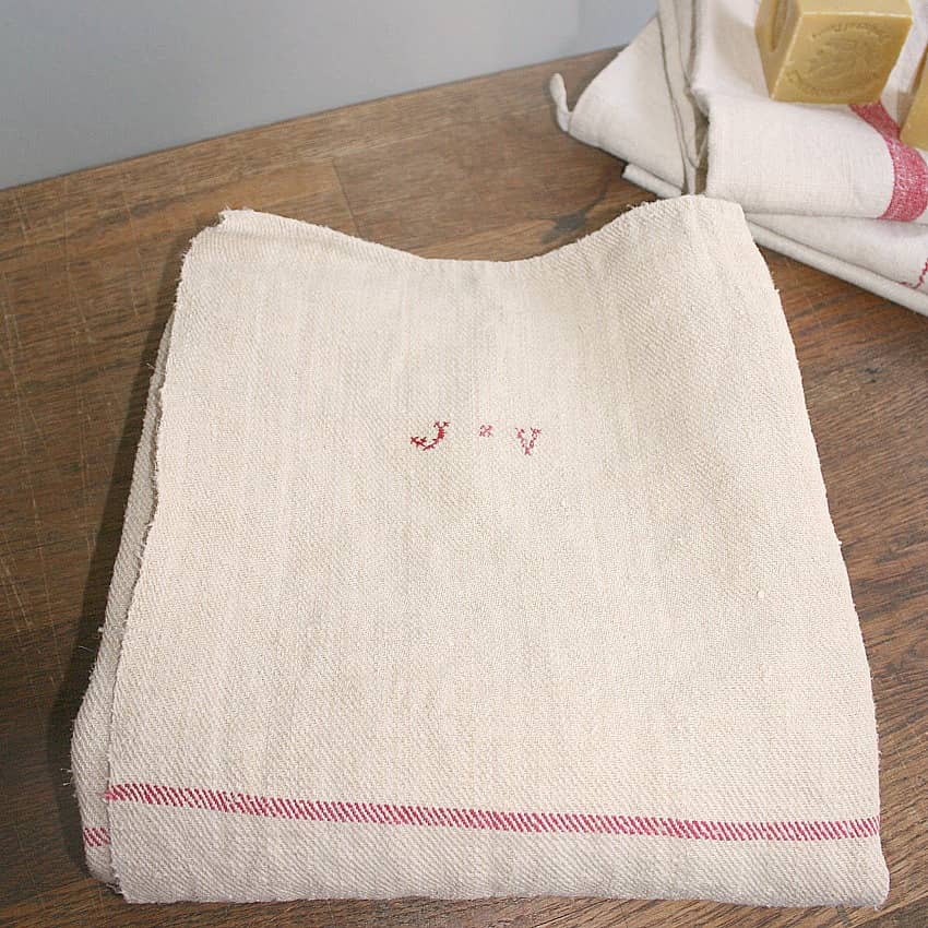 Folded 19th Century French family linen tablecloth with hand woven texture