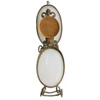 Antique French opaline glass egg-shaped pocket watch holder with gilt bronze stand, Belle Époque, 19th century, luxury decorative art, collectors piece.