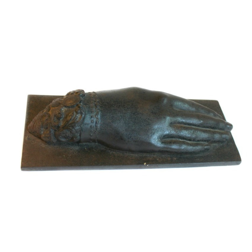 cabinet of curiosities bronze hand With lace cuff top view
