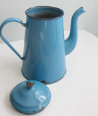 Antique-style French blue enamel coffee pot with patina detail and European kitchen charm