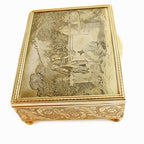 Rare antique French engraved jewelry box with a beautifully detailed signed pastorale courting scene. Gilt metal, bun feet, velvet lined interior, Made in France, floral scrolled sides.