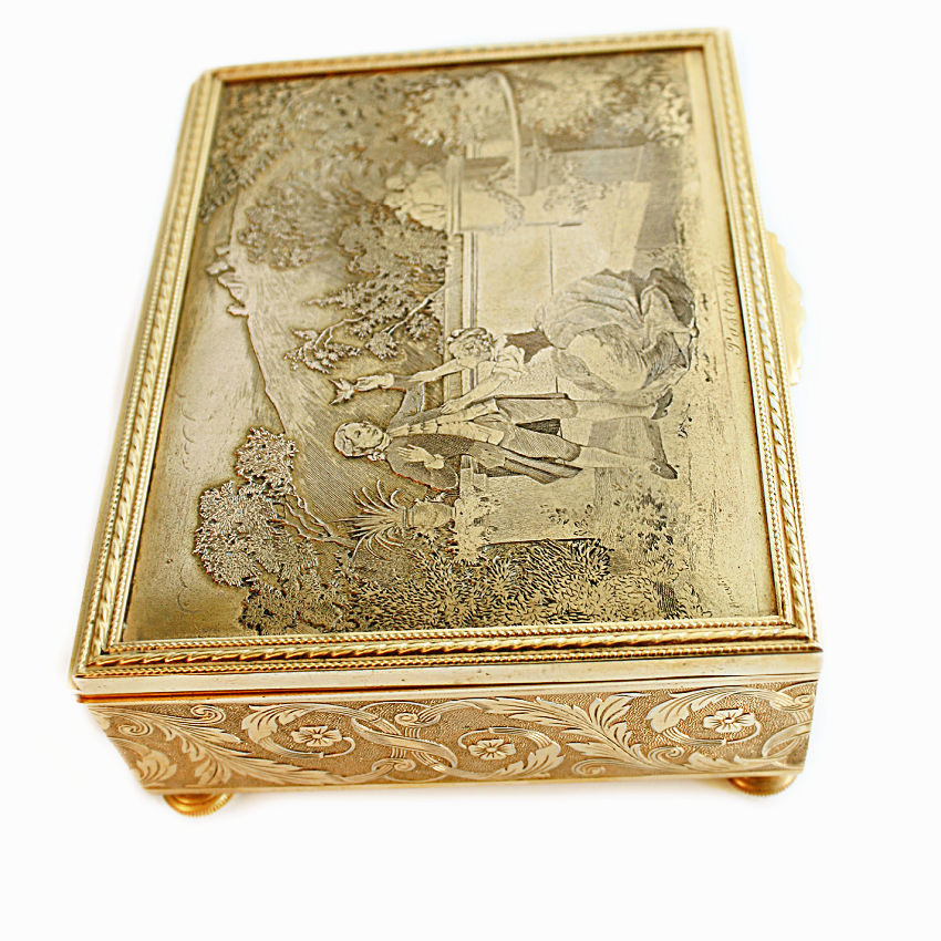 Rare antique French engraved jewelry box with a beautifully detailed signed pastorale courting scene. Gilt metal, bun feet, velvet lined interior, Made in France, floral scrolled sides.