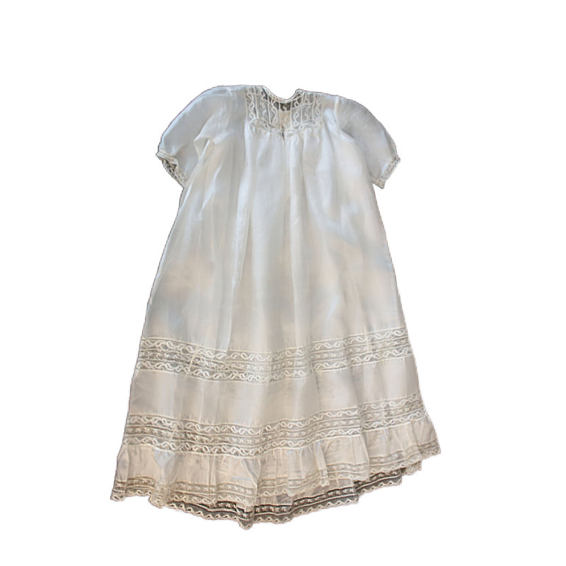 Antique French silk ivory christening gown and slip with handmade Valenciennes lace inserts, featuring a cream color with a lace pattern and buttons at the back.