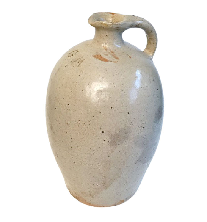 Beautiful 19th Century French olive oil pitcher with a greige glaze, featuring incised initials 'G M' on the front.