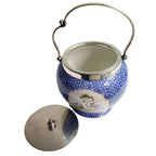 close up of inside, silver plated lid and handle on antique biscuit barrel