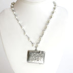 Antique sterling silver English vesta necklace with engraved match safe and pearl chain. A rare heirloom piece of antique jewelry.