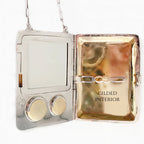 Open sterling silver compact case with mirror powder and compartments