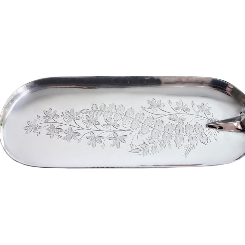 An antique Victorian silver plate fish server with a stag horn handle, featuring an engraved floral design.