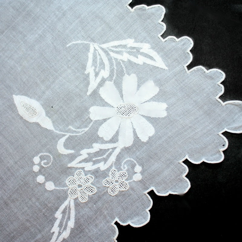 Elegant early 20th-century linen Madeira linen placemat with exceptional floral hand embroidery.