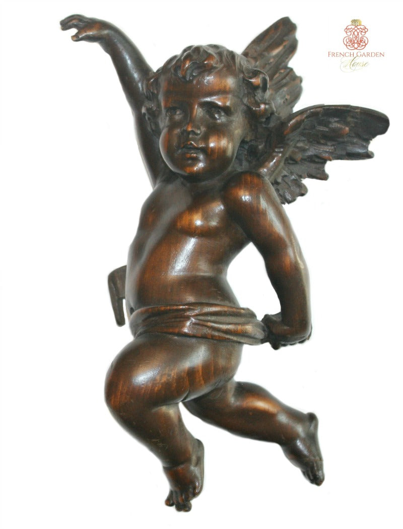 Rare antique Italian Baroque putti sculptures hand carved from wood with detailed feathered wings