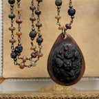 Antique Victorian gutta percha pendant on a tonal semi-precious beaded chain, 19th century, rare collectible jewelry, exquisite craftsmanship, collector’s piece.