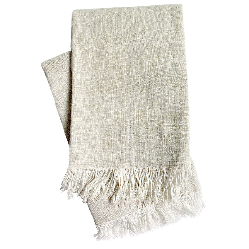 A pair of French antique natural linen tea towels with fringed bottoms.
