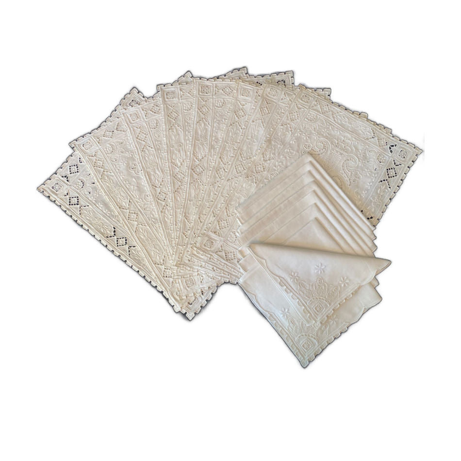 Beautiful Madeira linen table setting with intricate white hand embroidery