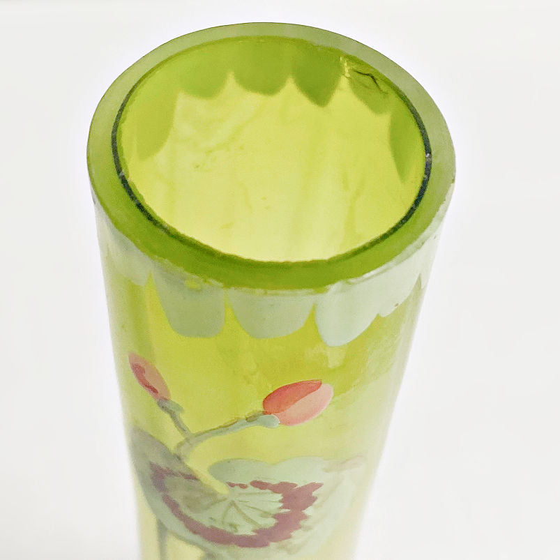 Delicate antique French vase with painted flowers on clear glass