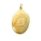 Back of antique gold-filled locket with E R F monogram