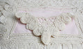Antique Battenberg lace linen table ensemble for eight with pink linen centers