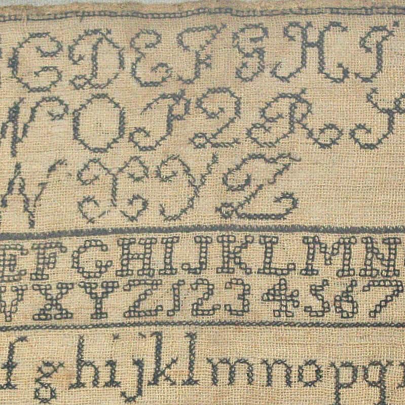 Antique sampler, 19th century embroidery, ABC sampler, handstitched, textile art, collectible needlework, antique education artifact, vintage embroidery, historic needlework, French garden decor, early schoolwork sampler