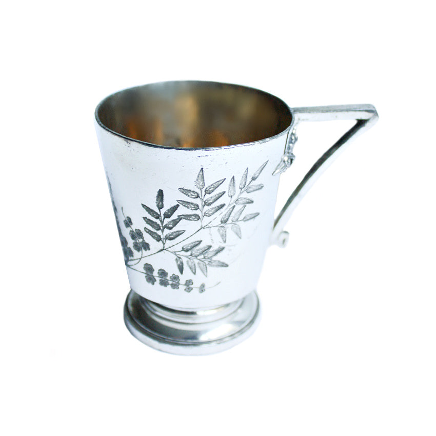 antique silver christening cup with ferns