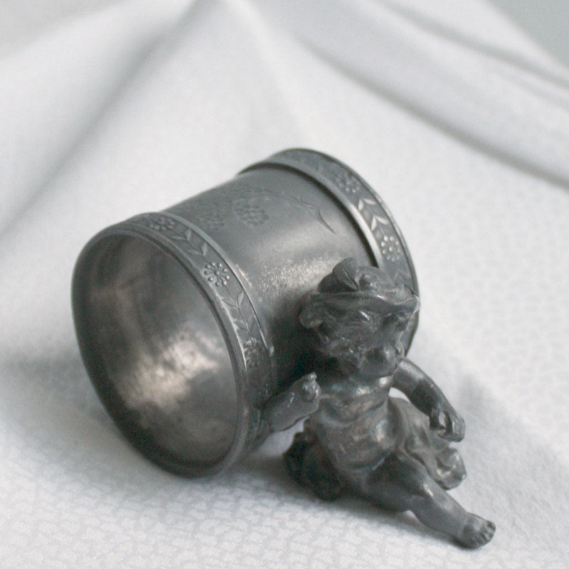 Antique Pairpoint Figural Napkin Ring with Cherub and Hat