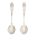 Pair of antique silver-plated jam spoons, monogrammed “D” and hand-engraved with rococo shell and leaf motifs. 