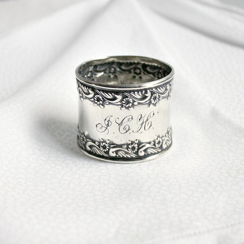 antique silver napkin ring with flowers