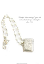 Antique sterling silver English vesta necklace with engraved match safe and pearl chain. A rare heirloom piece of antique jewelry.