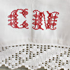 hand embroidered red C N initials antique French Métis linen sheet