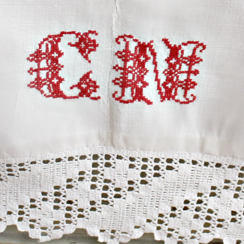 Hand made lace and linen textile from France with red monogram embroidery 