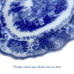 Antique English Flow Blue platter, deep cobalt blue with scenic country imagery, collectible transferware with scalloped edge.
