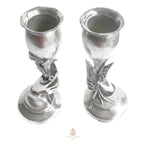 Silver plated figural hand vases with detailed floral sprig
