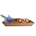 antique hand made lady's work tote filled with hyacinths, a trowel and spring bulbs