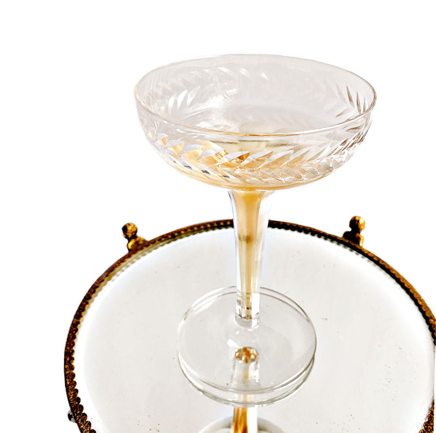 Art Deco glassware, Hollow stem champagne coupes, Laurel wreath, Set of 8, 1920s cocktail glasses, 1930s barware, Hand-blown glass, Jazz Age stemware, Vintage champagne, Collectible glassware, Deco entertaining, Elegant barware, Luxe vintage décor, Antique stemware, Decorative glass