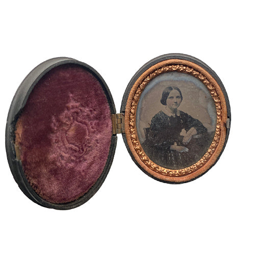 Antique oval Union Case featuring Girls Catching Butterflies motif, Civil War era thermoplastic photo case with interior damage as shown. 19th-century collectible.