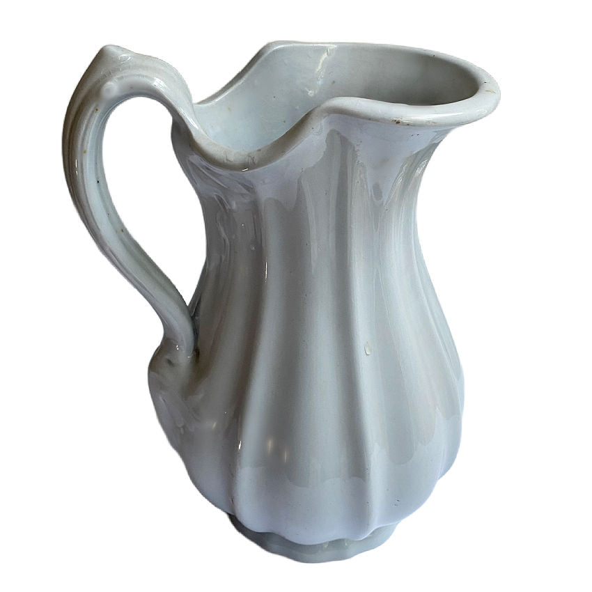 Elegant 12-1/2″ Meakin antique ironstone pitcher from classic English Staffordshire pottery. A rare collectible with timeless cream white glaze, ideal for display or floral styling. Increasingly difficult to find.